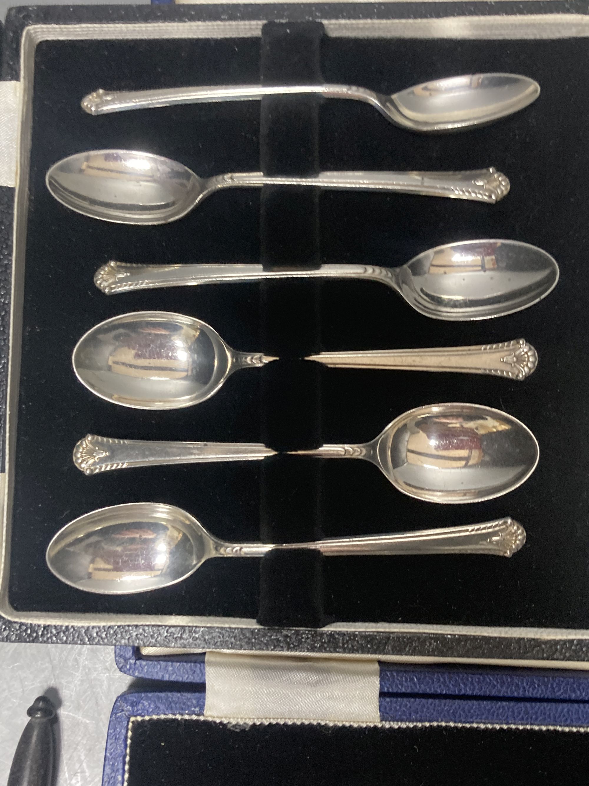 A cased set of six 1950s silver teaspoons, one other incomplete silver set and other flatware.